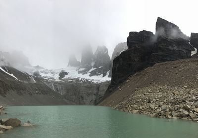 Panoramic view of lake and mountains against sky