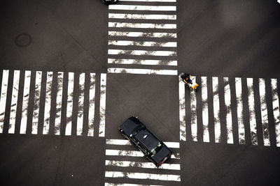 High angle view of road sign on street