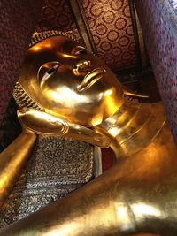 Low angle view of buddha statue in temple