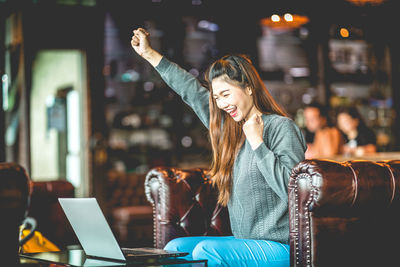 Young woman using mobile phone