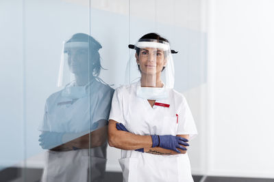 Female doctor wearing personal protective equipment