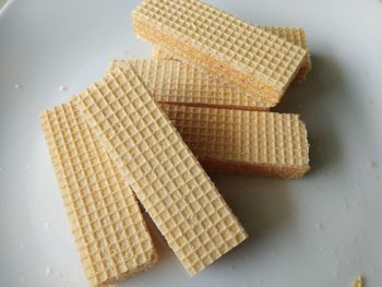 High angle view of bread on cutting board