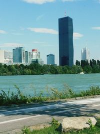 Buildings in city against sky