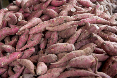 Full frame shot of sweet potatoes for sale at market stall