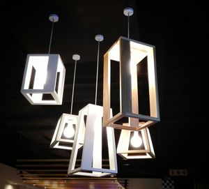 Low angle view of illuminated lighting equipment