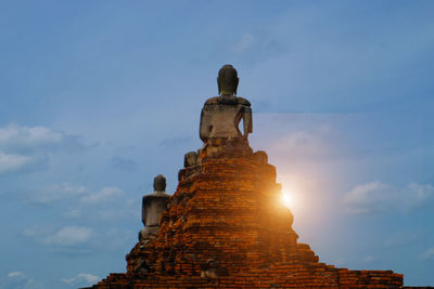 Low angle view of statue against sky