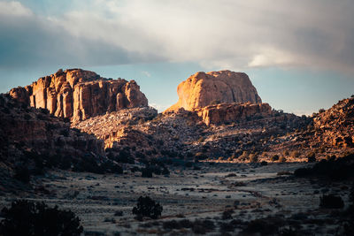 Rock formation on land against sky