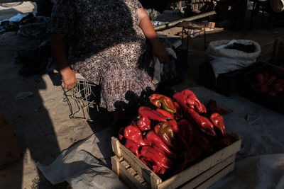 High angle view of woman preparing food at market