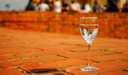 Close-up of wineglass on table