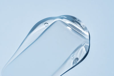 Close-up of water bottle against white background