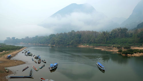 Scenic view of lake by mountains