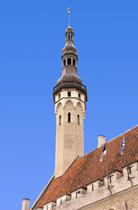 Low angle view of historic building against clear blue sky