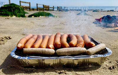 Close-up of pumpkins on beach
