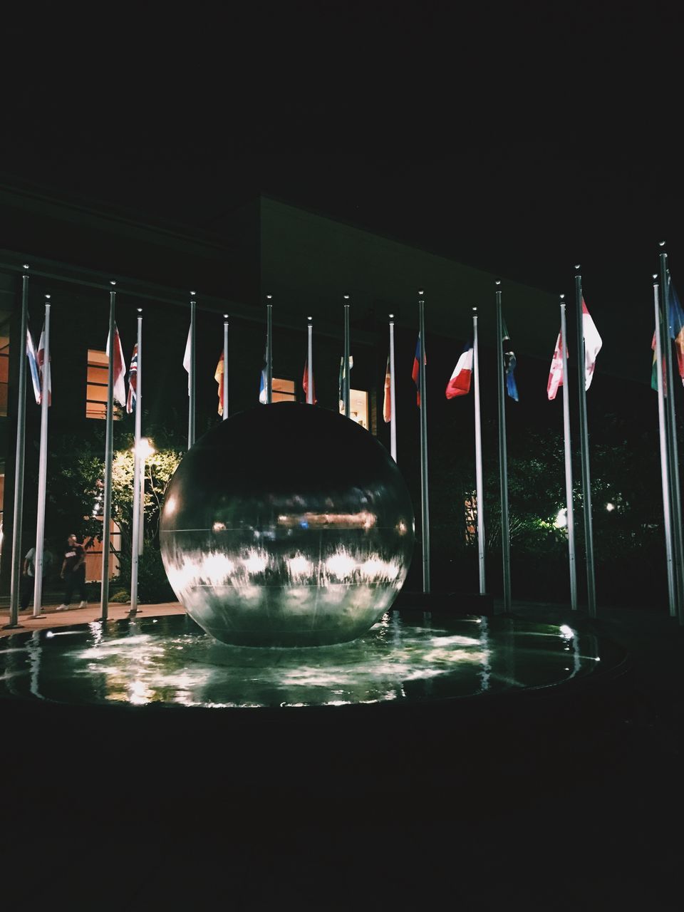 glass - material, transparent, no people, illuminated, reflection, water, indoors, night, flag, table, nature, architecture, decoration, patriotism, close-up, glowing, shape, copy space