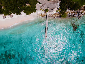 High angle view of swimming pool by sea