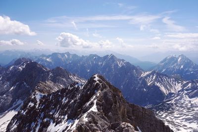 Scenic view of mountains against sky during winter