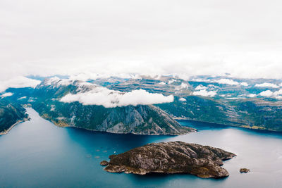 Aerial view of mountain by sea