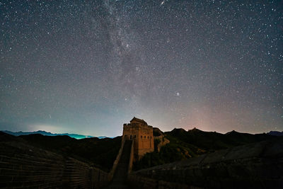 Scenic view of building against sky at night