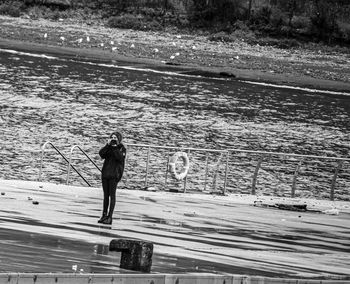Full length of woman standing on land