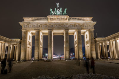 Low angle view of illuminated brandenburg gate at night