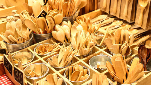 Handmade wooden cutlery exposed in a market in thailand.