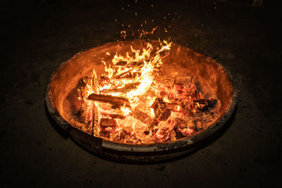 High angle view of fire in the dark