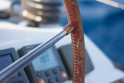 Close-up of rope tied to railing