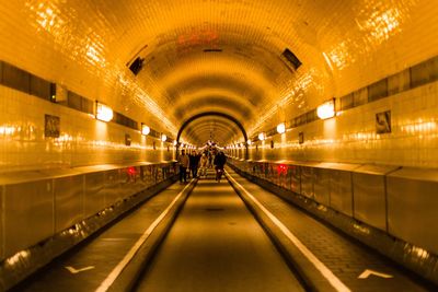 People walking on subway station road