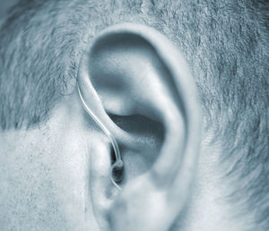 Close-up of man wearing hearing aid