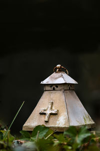 Close-up of birdhouse on wood