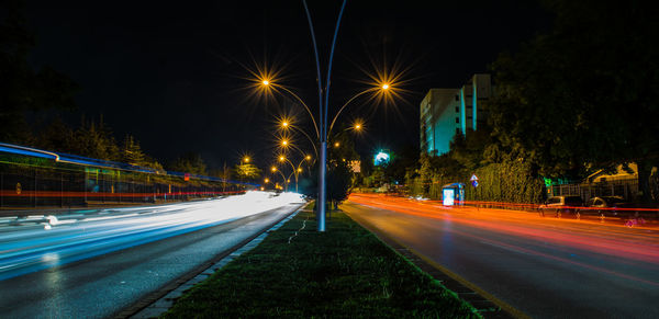 Light trails of moving traffic on street