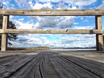 Close-up of wood against sky