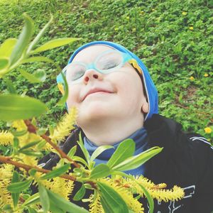 Portrait of boy with plants