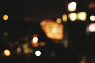 Defocused image of illuminated lights at night