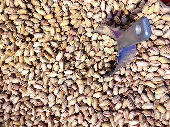 Full frame shot of pistachios for sale at market