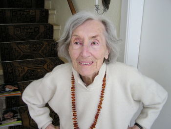 Portrait of smiling woman at home