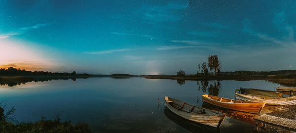 Panoramic view of lake against sky at night