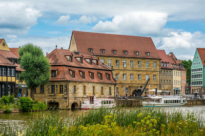 View of buildings in city against sky