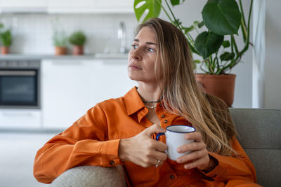 Young woman using mobile phone