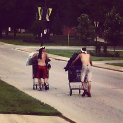 Woman sitting on tree stump