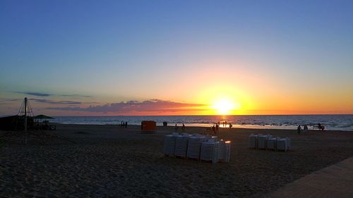 Scenic view of beach during sunset