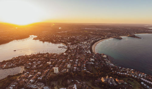 Drone sunset view of manly, an affluent seaside suburb of sydney, new south wales, australia. 