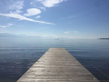 Pier over sea against sky