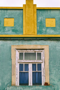 Low angle view of closed window of building