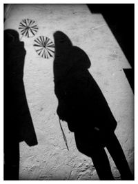 Shadow of man on wall