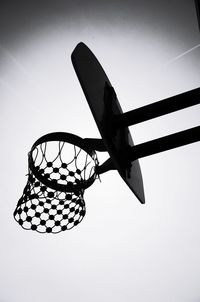 Low angle view of basketball hoop against sky