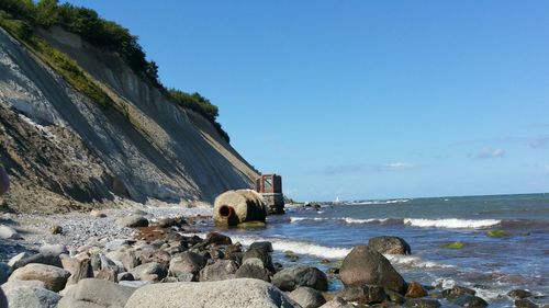 Scenic view of sea against clear blue sky