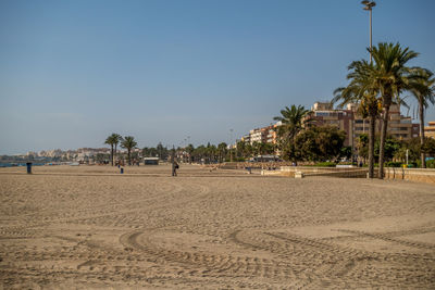 Scenic view of beach against clear sky