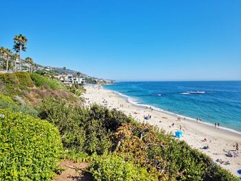 Scenic view of sea against clear blue sky