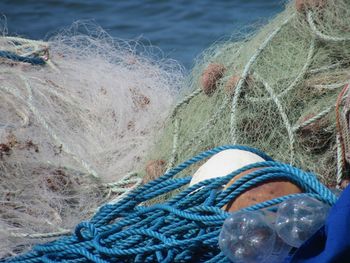 High angle view of fishing net at beach